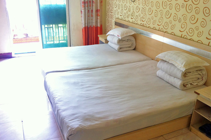 在武汉装修想开个20个房间左右的小旅馆,请专