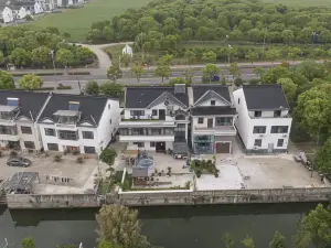 Suzhou Dao Xiang Impression Homestay (Cai Flower Sea Shop in Bei Tai Lake Tourist Vacation Area)