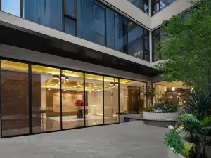 七里酒店(洛阳王城公园七里河地铁站店店)