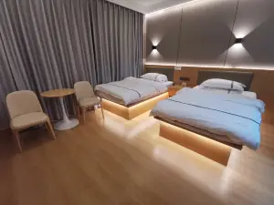 Zhengxiang Baiqi Yousu Hotel
