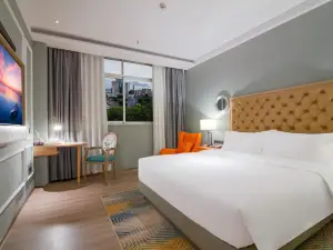 โรงแรมลักซ์คาบินส์ (สาขา สถานีซิงหนิง เหม่ยโจว พลาซ่าซิงอี้)