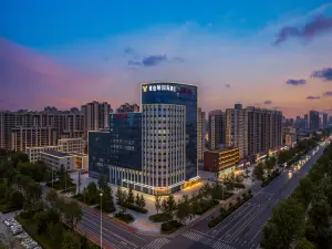 Vienna International Hotel (Heze Shan Development Zone Shunshi Building)