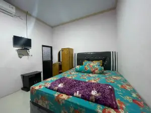 OYO 93308 Lima Saudara Syariah