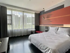 Home Inn UP Huayi Element Boutique Hotel (Wanyuan Railway Station Branch)