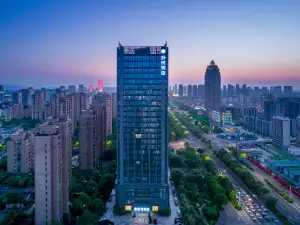 Shuyue Hotel (Shaoxing East Railway Station Wanhe City Branch)
