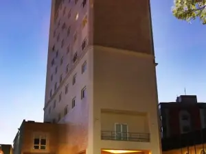 Le Village Flats e Hotel