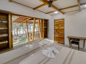 Open, dog-friendly, beachfront house with a private pool, hot tub, & WiFi