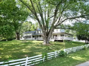 HISTORICAL FARM HOUSE, 15 ACRES, CREEK, WRAP AROUND PORCH, ALL TO YOURSELF!