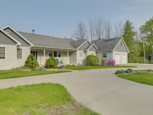 Lakefront de Tour Village Home w/ Deck & Fire Pit!