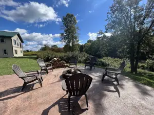 Relax at The Lincoln Log Cabin perched along the Jump River.