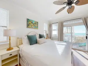 Three-story beachfront retreat with a Gulf view, game room, washer/dryer & AC