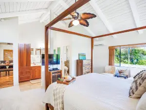Spacious home with charming views from lanai - walk to the beach