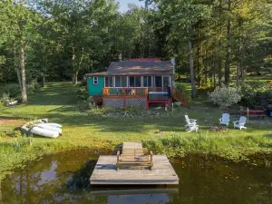 Magical lakeside retreat with hot tub + dog friendly!
