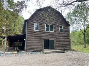Restored 100-year-old Barn House in Private Forest. Perfect for gatherings.