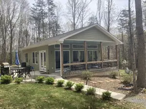 Glasshouse in the Woods. Five acres of wooded privacy and wildlife.