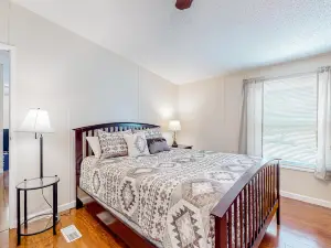 Riverfront home with water views, firepit, deck, grill, fireplace - dog-friendly