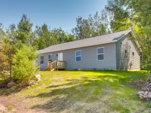 Wooded Hancock Home Near Ski and Snowmobile Trails!