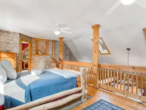 Dog-friendly cabin on expansive land with a firepit, grill, game room, & W/D
