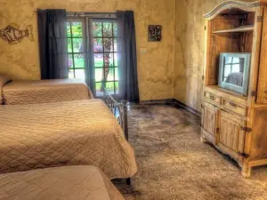 6-bedroom Lodge on 12 acres in Concan, Texas.  Swimming pool & hot tub.