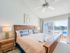 Sunset Cove - Waterways lakefront retreat with boat slip, pool & beach - dogs OK