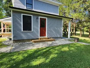 Charming 3-bedroom farmhouse on 20 acres located in rustic Corbin City.