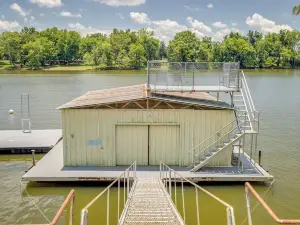 TWO homes on Black River Lake with TWO boat slips!
