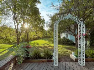 Vintage kitsch 70s/80s themed house with indoor pool and backyard creek