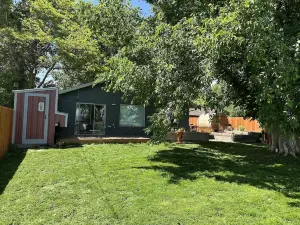 Pet friendly home with fenced yard, gardens and sauna one block from Main Street