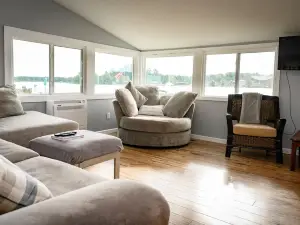 Lake front property with a relaxing front deck overlooking Bristol Lake