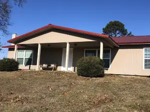 Beautiful views of the Caddo River from this Glenwood river home!