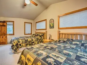 Riverfront Manton Cabin with Pool Table and Fire Pit!