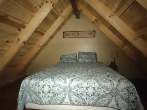 Quaint, secluded cabin with the feel of home. Sleeps 4 with home-like amenities.