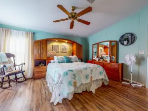 Canal-Front Home with Private Covered Boat Dock & Waterfront Screened Porch