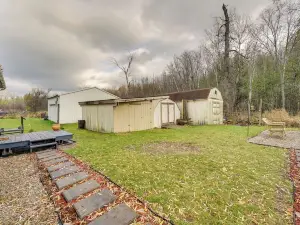 Lakefront Reed City Home w/ Fire Pit on 2 Acres!