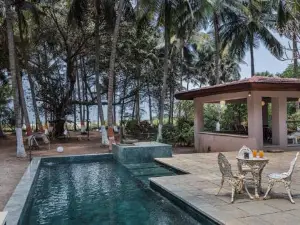 SaffronStays Bay Watch, Palghar - beachfront pool villa at Kelwa Beach