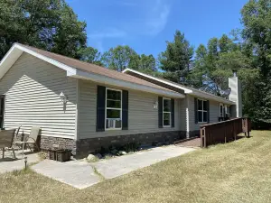 Escape to Northern Michigan! Private, secluded with spa.  ORV/snowmobile trail.
