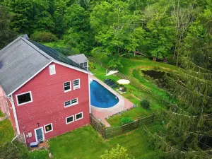 Historic Barn Retreat w/ Pool & Pond Views Longview Pond Lodge by Avantstay