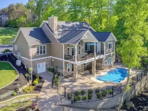 BEST location on Smith Mtn lake! Waterfront home w POOL & Dock in no wake zone.