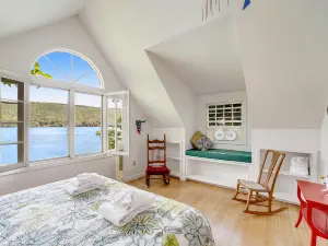 Unique & charming lakefront home with screened-in patio
