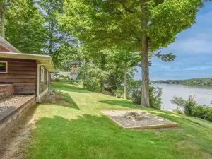 Rustic Hills Retreat...a scenic home on beautiful lake front property.