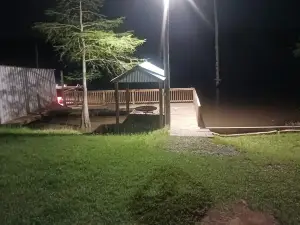 Cozy home with great fishing from dock.Peaceful and Private with nature trails.