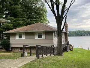Relax Lakefront-Stunning Lake Views in Popular Sister Lakes! Private Sand Beach!
