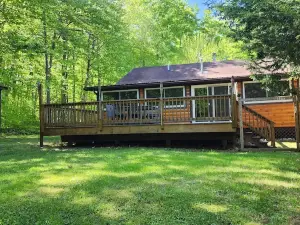 A cozy, pristine family retreat located in the town of Inlet.