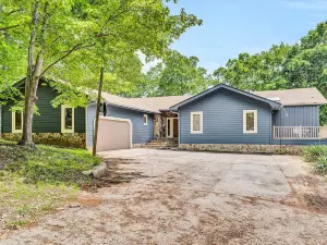Lakefront home with private hot tub, balcony, dock, & pool table
