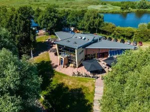 Colorful Chalet with Veranda, Located in Friesland