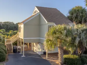 Coastal Villa with Deck and Neighborhood Pool - Inviting and Spacious Escape