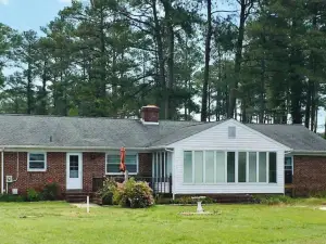 Waterfront Retreat on 4 acres with boat slips.