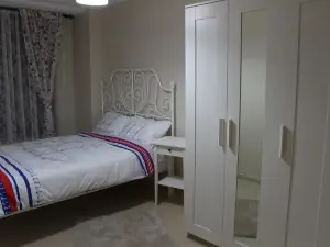 Kinzi House