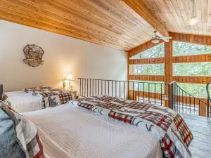 Roomy condo with deck, pool, beach, & wood finishes- near skiing & fishing