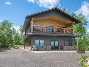 Cabin is Nestled in the Woods Near Lake Vermilion, Offering Breathtaking Views.